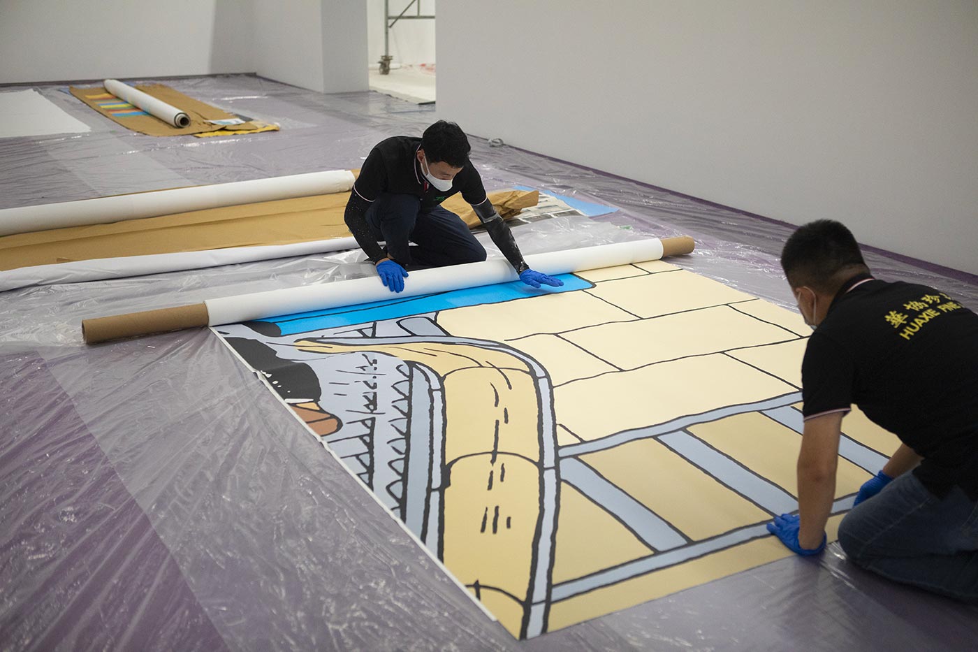 Montage de l'exposition Hergé à Shanghai